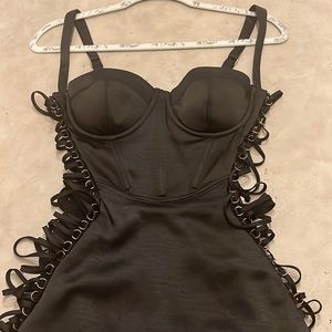 Sexy black strapped dress from House of CB. Mesh sides with corset like ties!